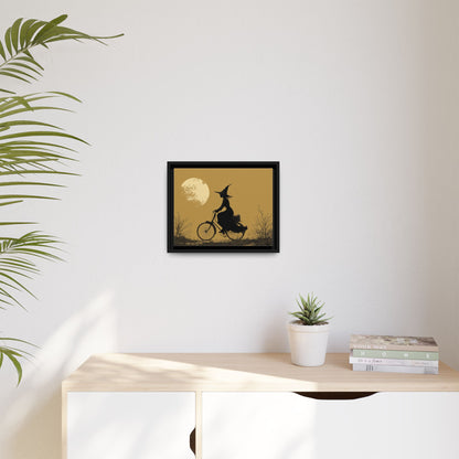 Witch on Bicycle Framed Canvas Wall Art