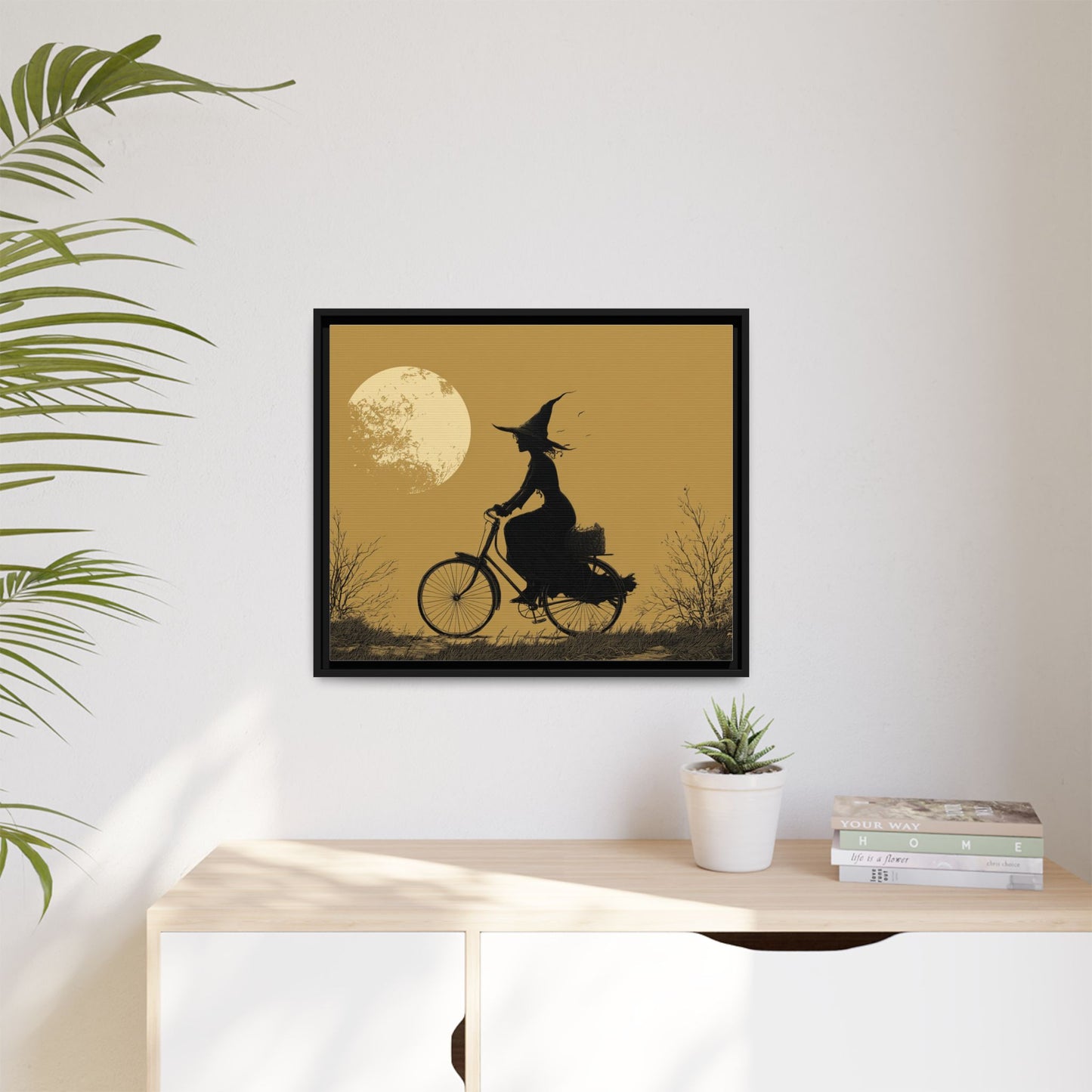 Witch on Bicycle Framed Canvas Wall Art