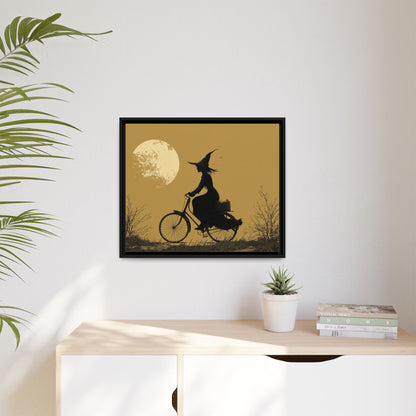 Witch on Bicycle Framed Canvas Wall Art