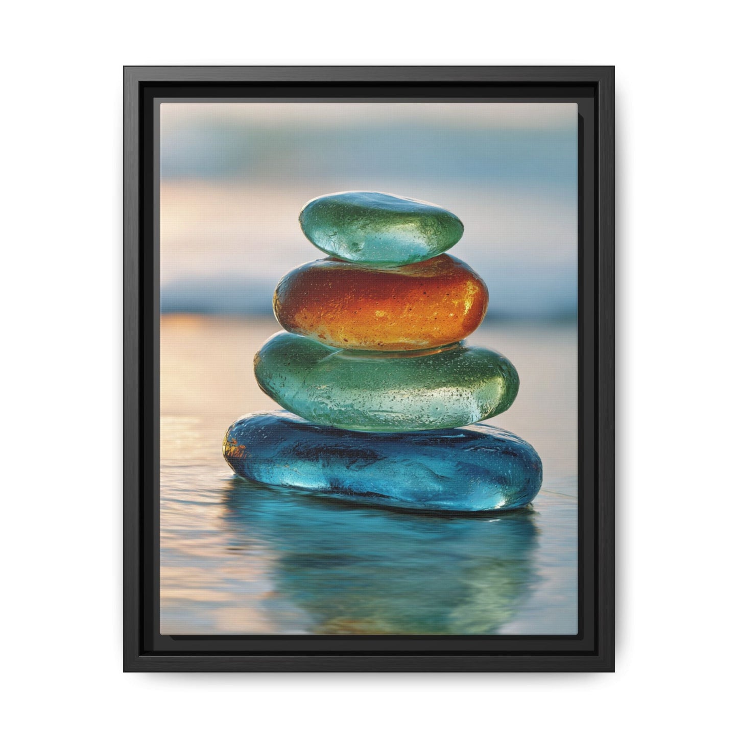 Stone framed canvas wall art of stacked colorful stones on water with calming sunset background