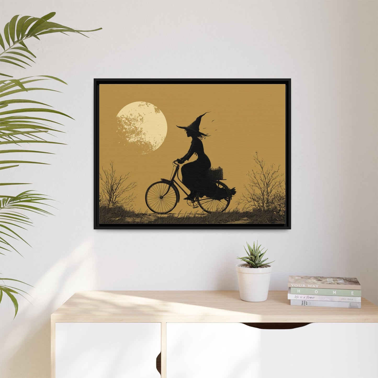 Witch on Bicycle Framed Canvas Wall Art