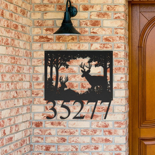 Custom metal house numbers sign with deer design mounted on brick wall near wooden door